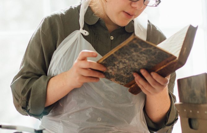 Volunteer reading book