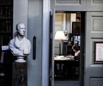 Bust next to open door